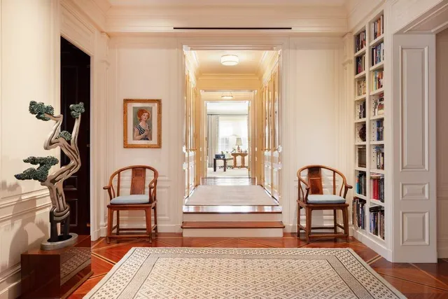 a view of a livingroom with furniture and a rug