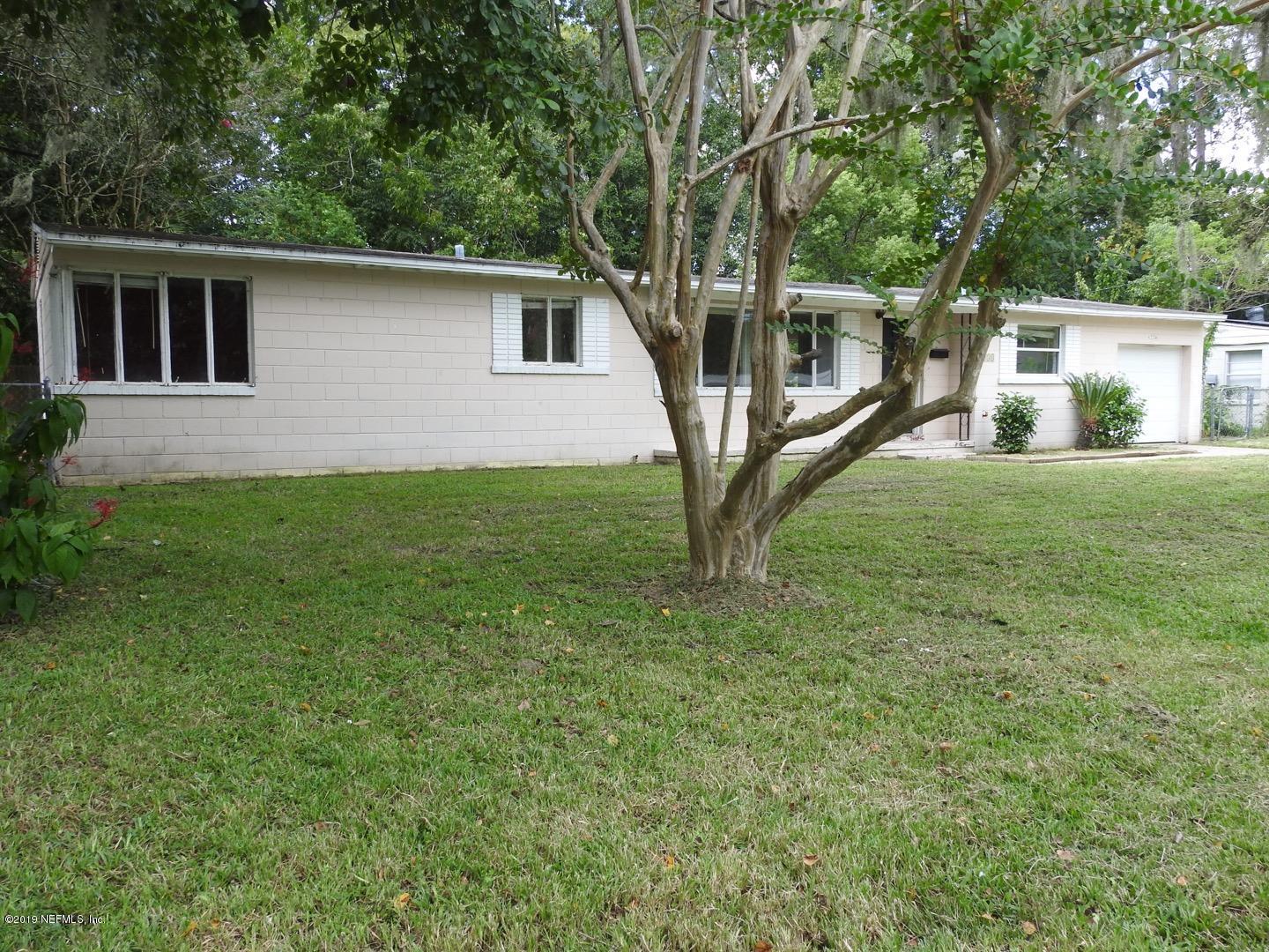 4238 Springwood Road Jacksonville, FL 32207 - Photo 3 of 19 a house view with a backyard space