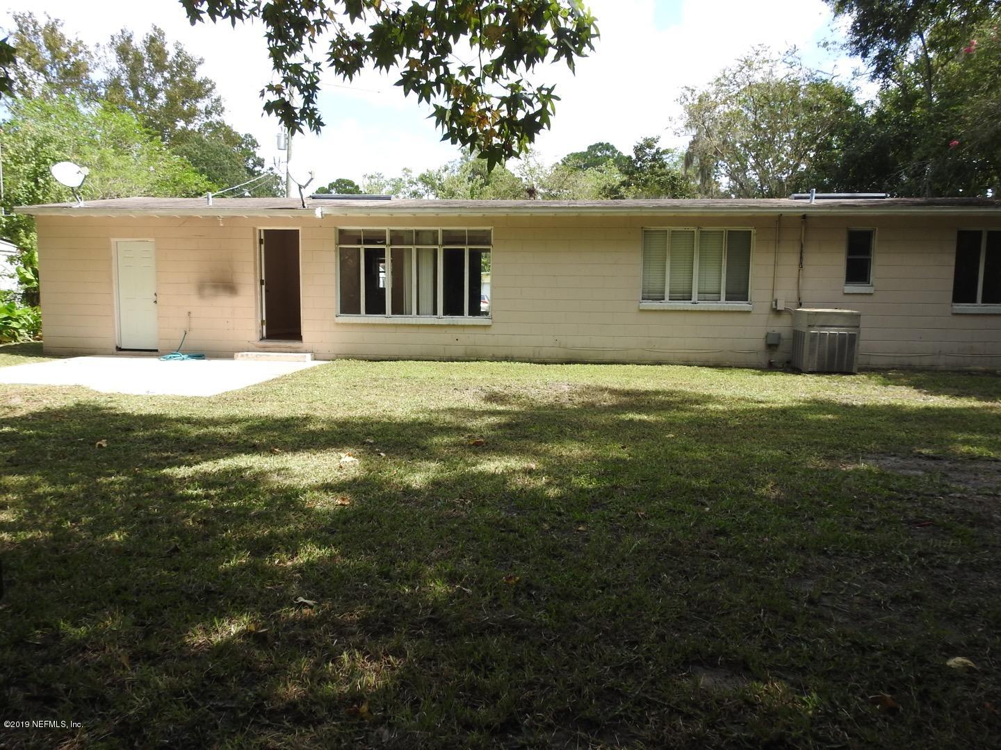 4238 Springwood Road Jacksonville, FL 32207 - Photo 6 of 19 a backyard of a house