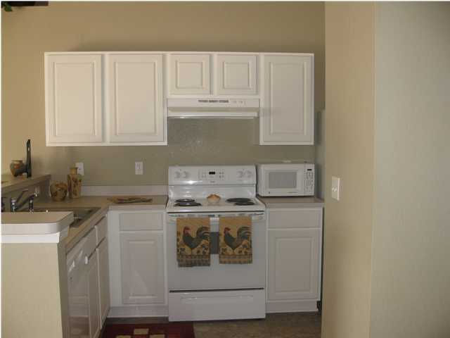 305 Seclusion Boulevard Crestview, FL 32536 - Photo 5 of 12 a utility room with dryer and washer
