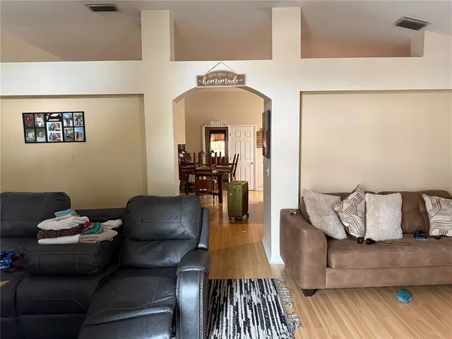 a living room with furniture and a couch