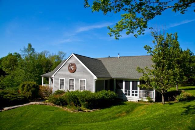 84 Kinney Hill Road Washington, CT 06777 - Photo 1 of 1 a front view of a house with a yard