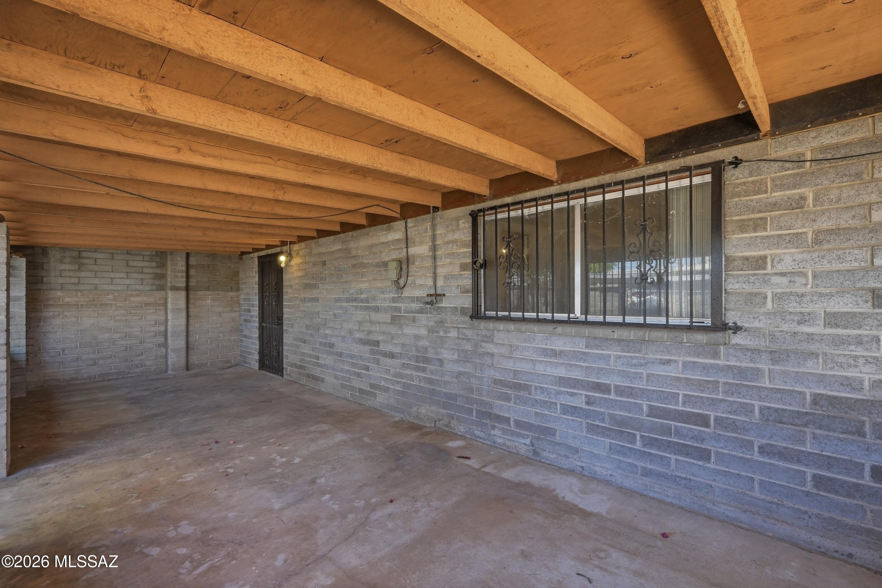 1808 West Caravelle Road Tucson, AZ 85713 - Photo 33 of 38 a view of empty room with wooden floor