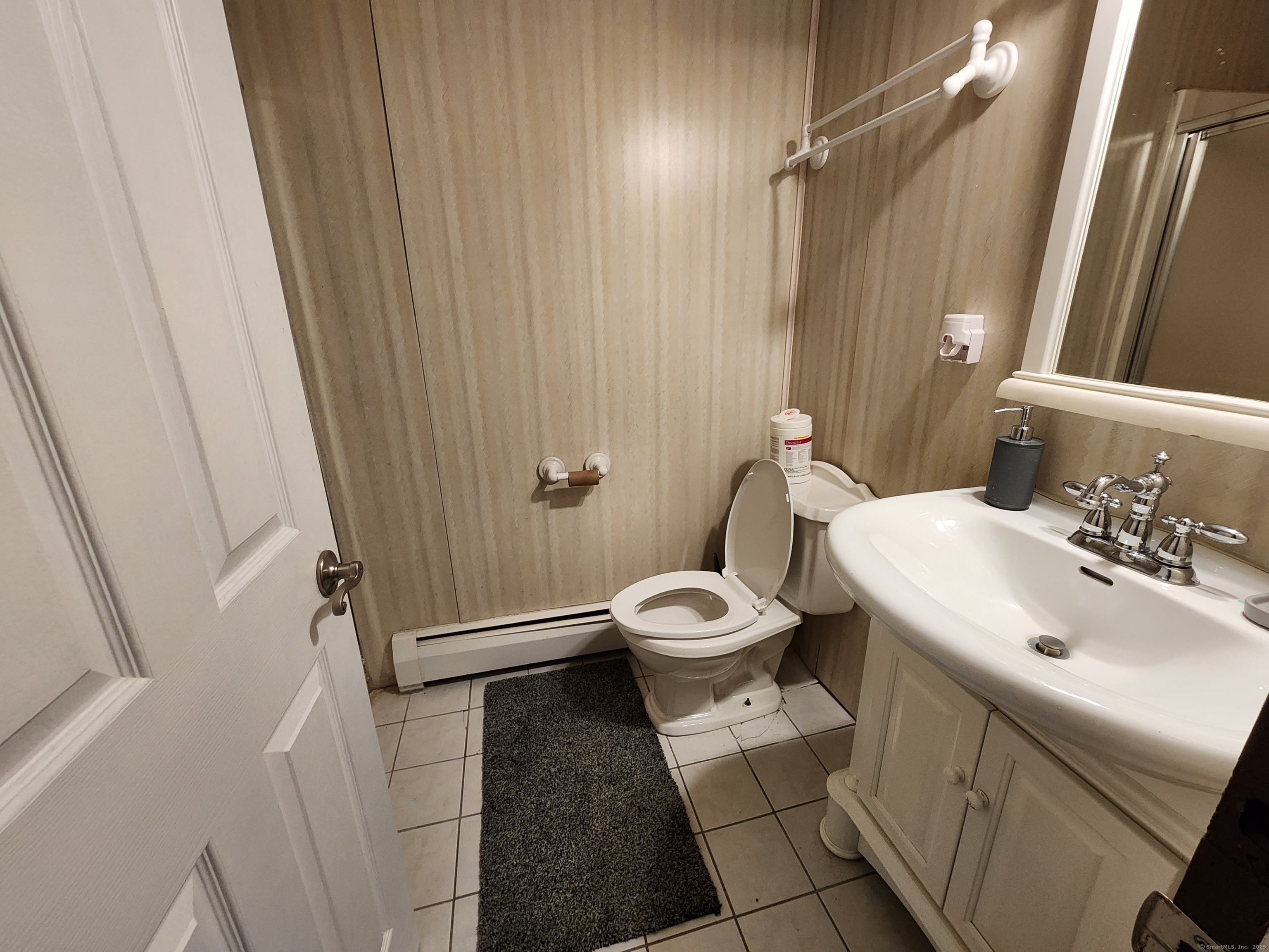 189 Kaynor Drive, Unit C Waterbury, CT 06708 - Photo 5 of 6 a bathroom with a sink toilet and shower