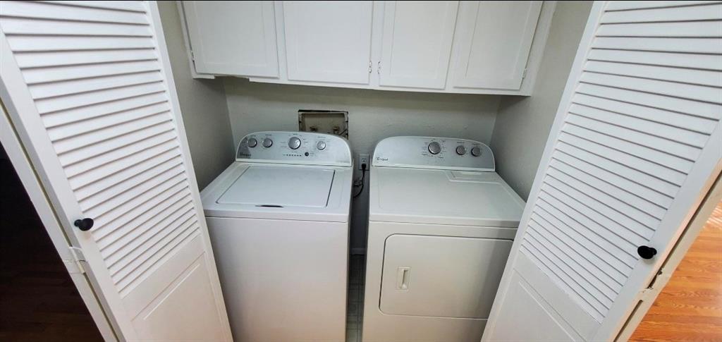 15889 Preston Road, Unit 1004 Dallas, TX 75248 - Photo 11 of 17 a utility room with dryer and washer