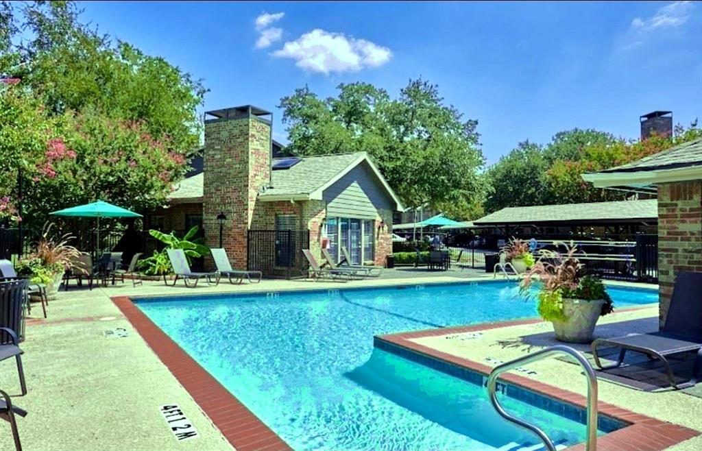 15889 Preston Road, Unit 1004 Dallas, TX 75248 - Photo 2 of 17 a view of an house with backyard space and balcony