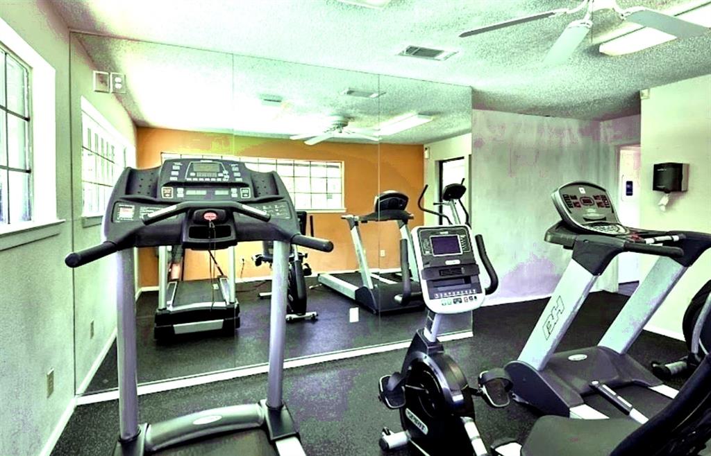 15889 Preston Road, Unit 1004 Dallas, TX 75248 - Photo 3 of 17 a view of a room with gym equipment