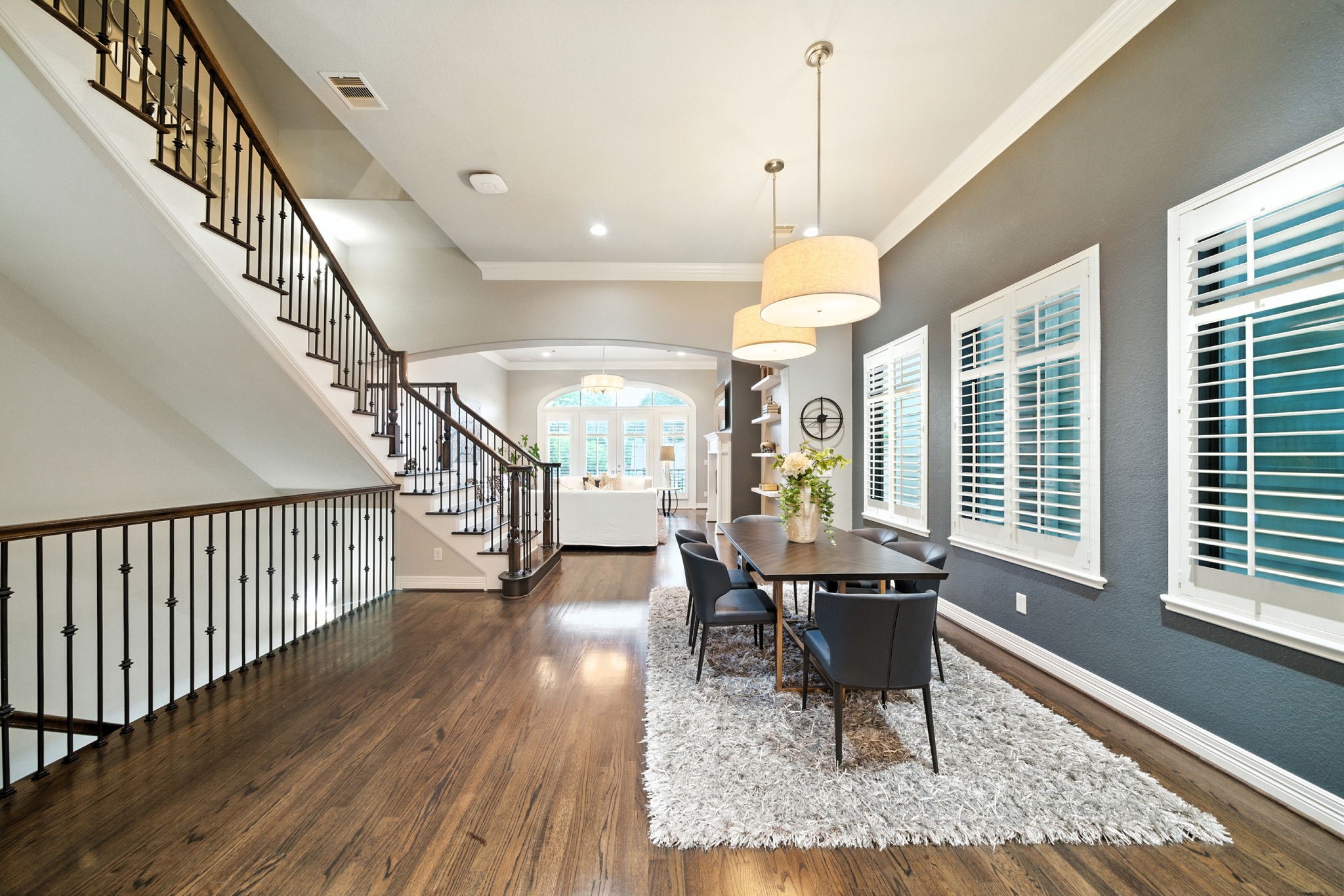 803 Bomar Street, Unit A Houston, TX 77006 - Photo 12 of 39 a dining room with wooden floor and large windows