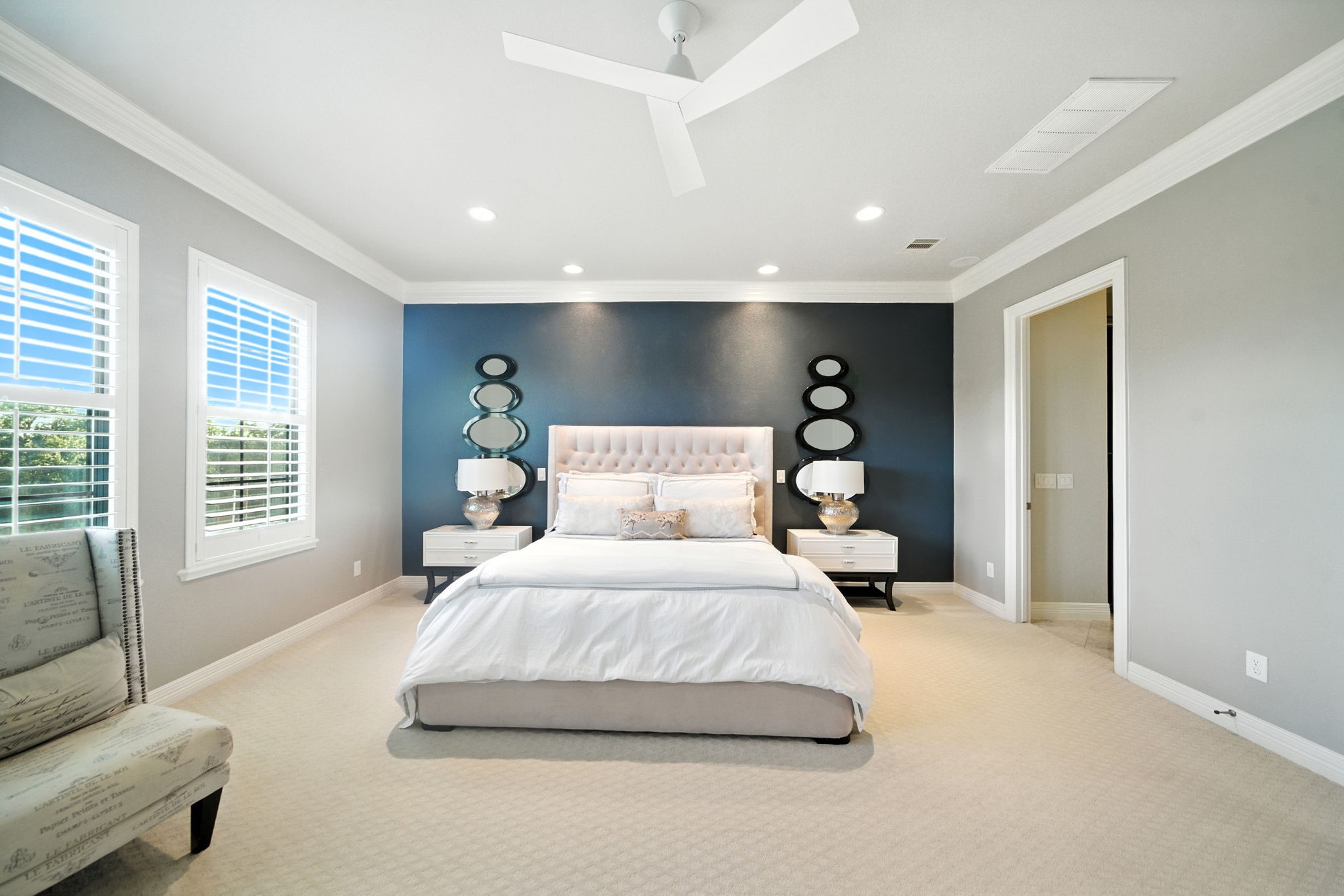 803 Bomar Street, Unit A Houston, TX 77006 - Photo 21 of 39 a spacious bedroom with a large bed and a large window