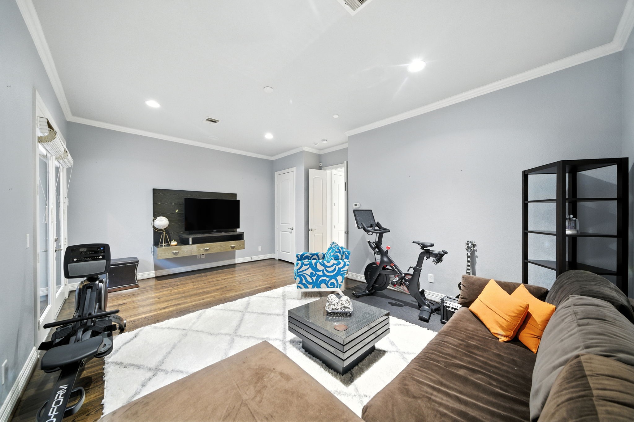 803 Bomar Street, Unit A Houston, TX 77006 - Photo 27 of 39 a living room with furniture and a flat screen tv