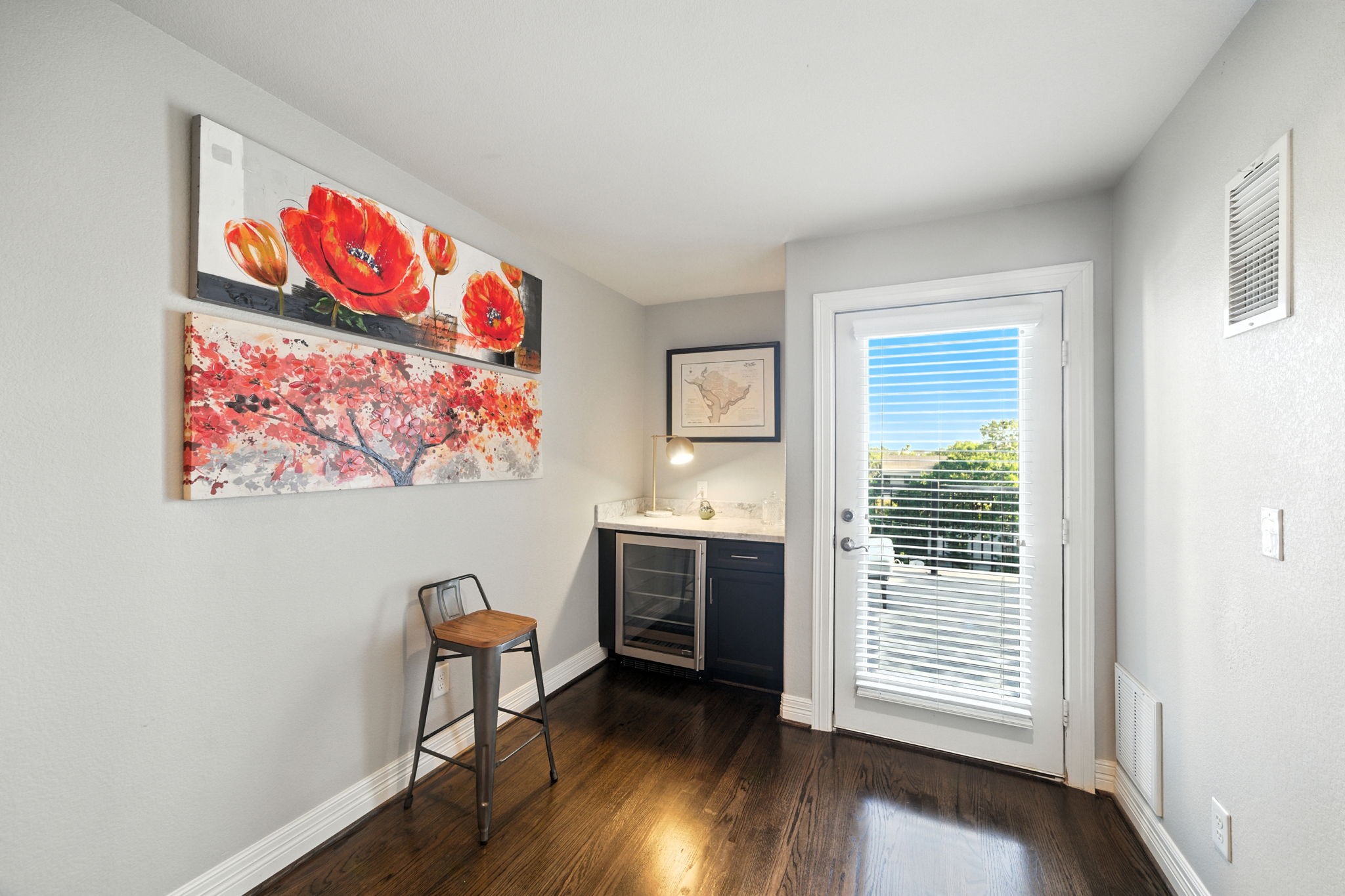 803 Bomar Street, Unit A Houston, TX 77006 - Photo 34 of 39 a workspace with furniture wooden floor and window