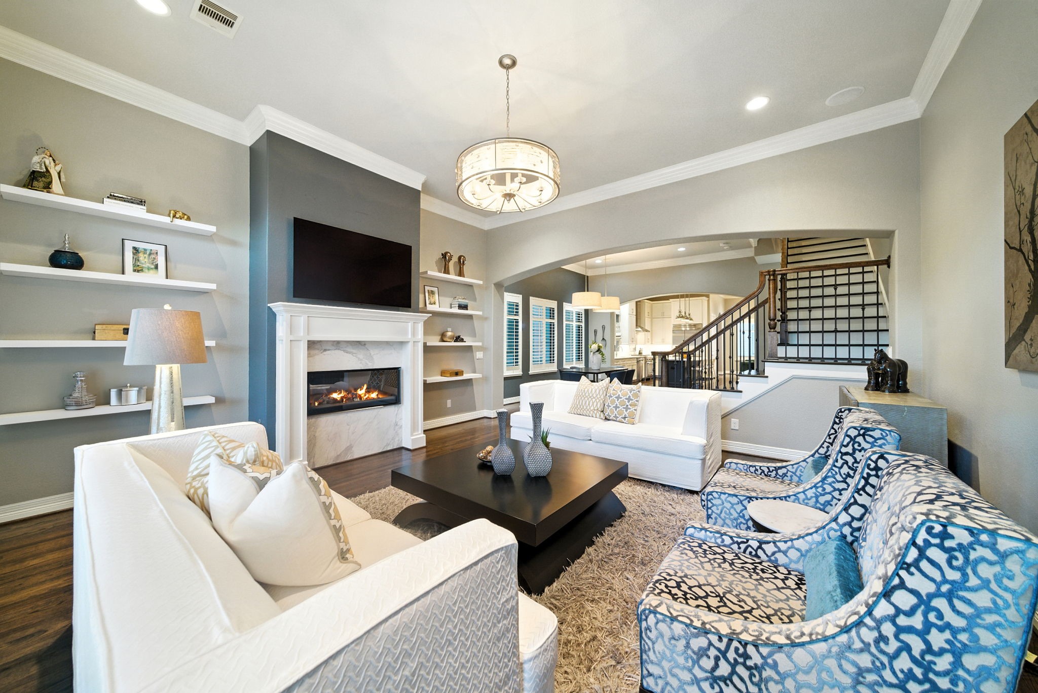 803 Bomar Street, Unit A Houston, TX 77006 - Photo 5 of 39 a living room with furniture a fireplace and a flat screen tv