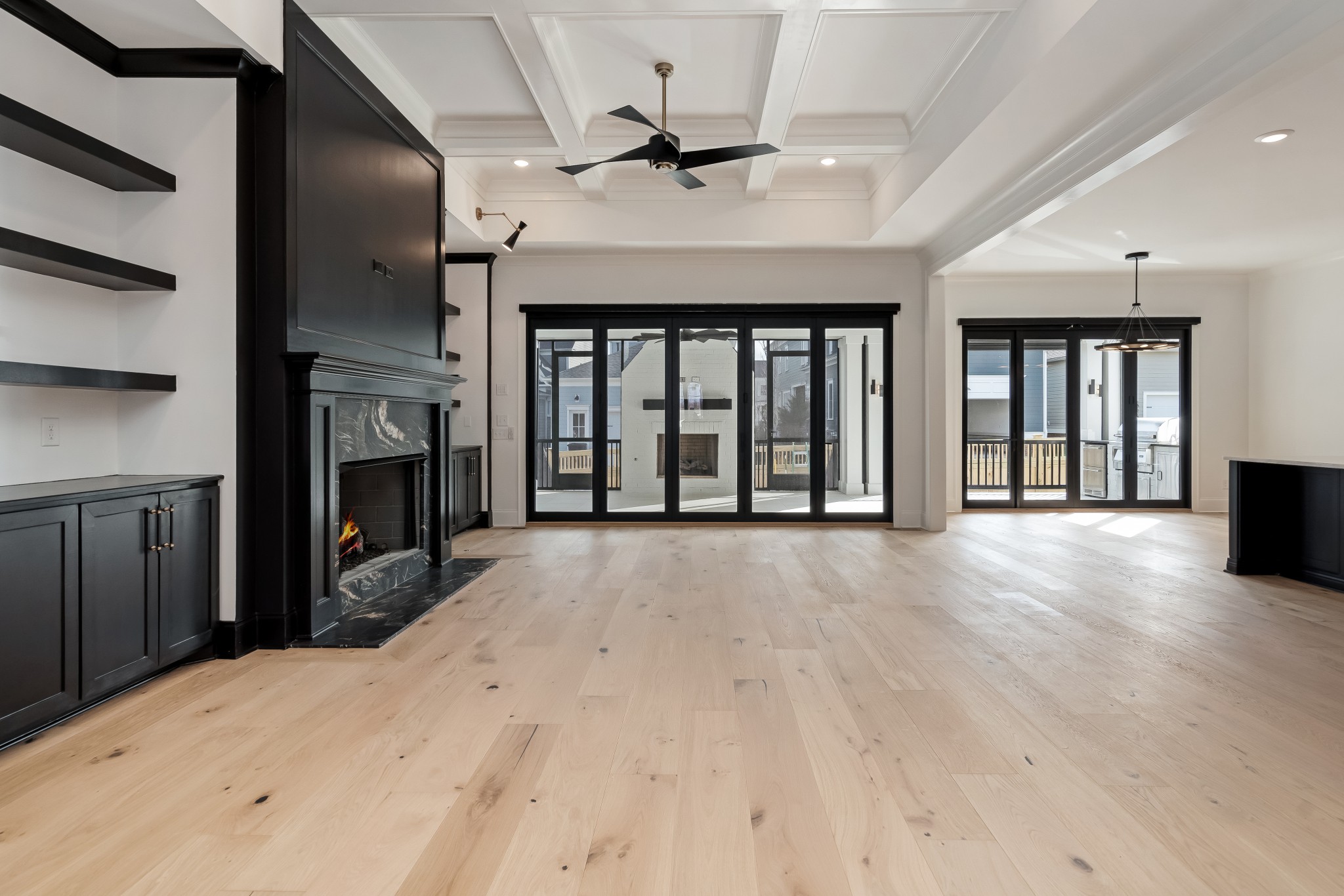 214 Old Peytonsville Road Franklin, TN 37064 - Photo 11 of 42 a view of an empty room with a fireplace and a window