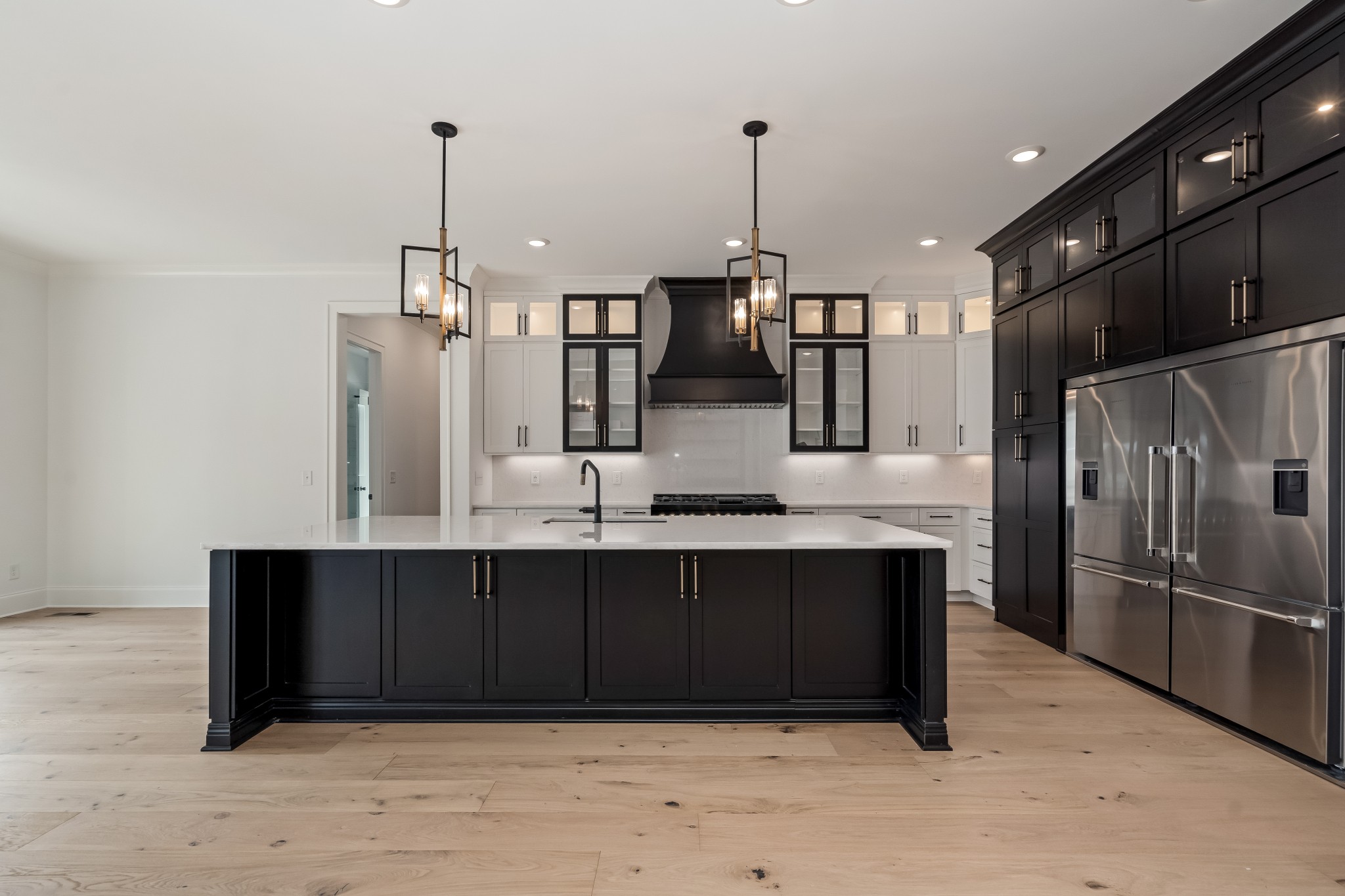 214 Old Peytonsville Road Franklin, TN 37064 - Photo 14 of 42 a kitchen with stainless steel appliances a sink and refrigerator
