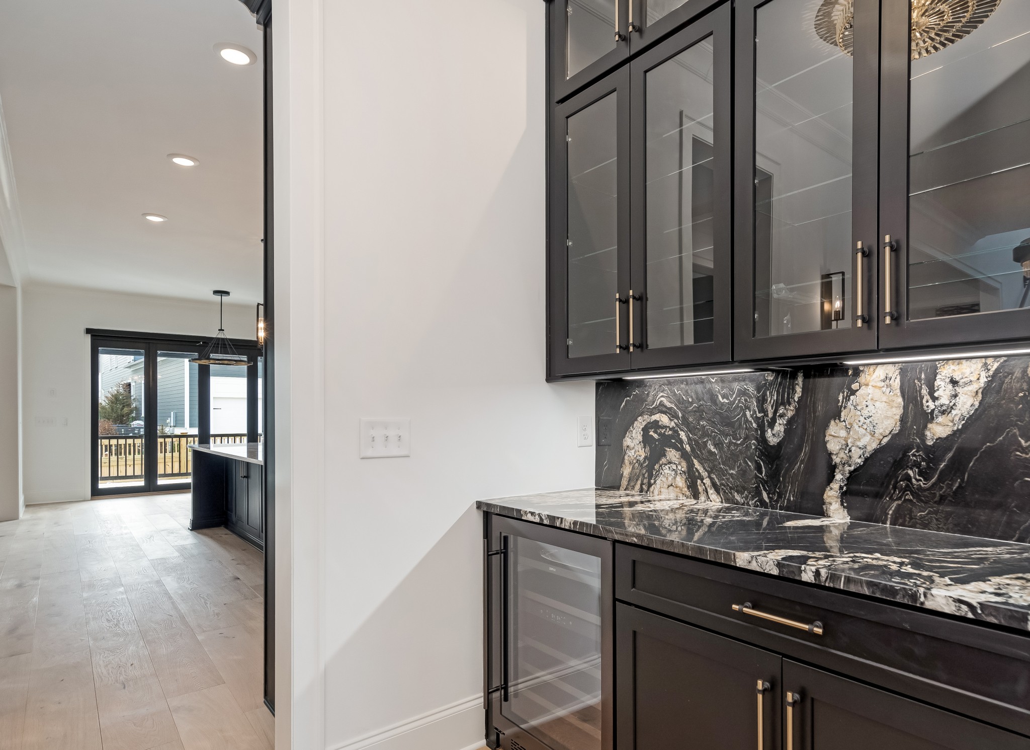 214 Old Peytonsville Road Franklin, TN 37064 - Photo 18 of 42 a kitchen with granite countertop a sink and cabinets