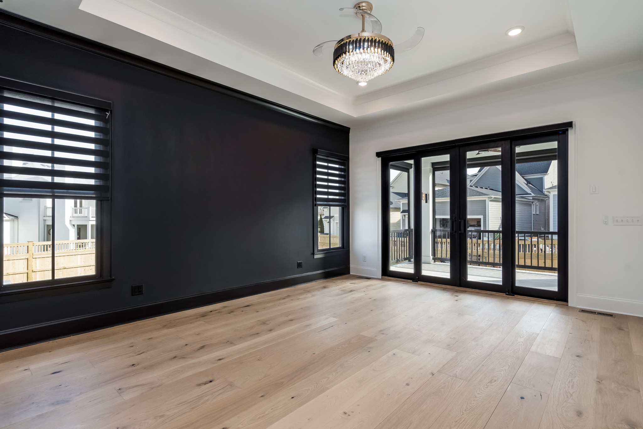 214 Old Peytonsville Road Franklin, TN 37064 - Photo 20 of 42 a view of an empty room with a window and wooden floor