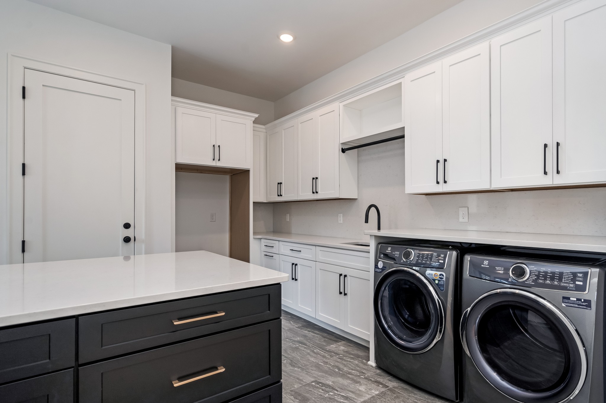 214 Old Peytonsville Road Franklin, TN 37064 - Photo 28 of 42 a kitchen with a sink cabinets and washer
