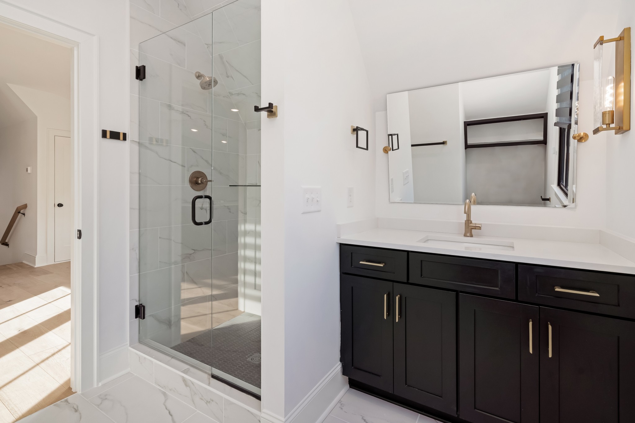 214 Old Peytonsville Road Franklin, TN 37064 - Photo 33 of 42 a bathroom with a shower sink and mirror