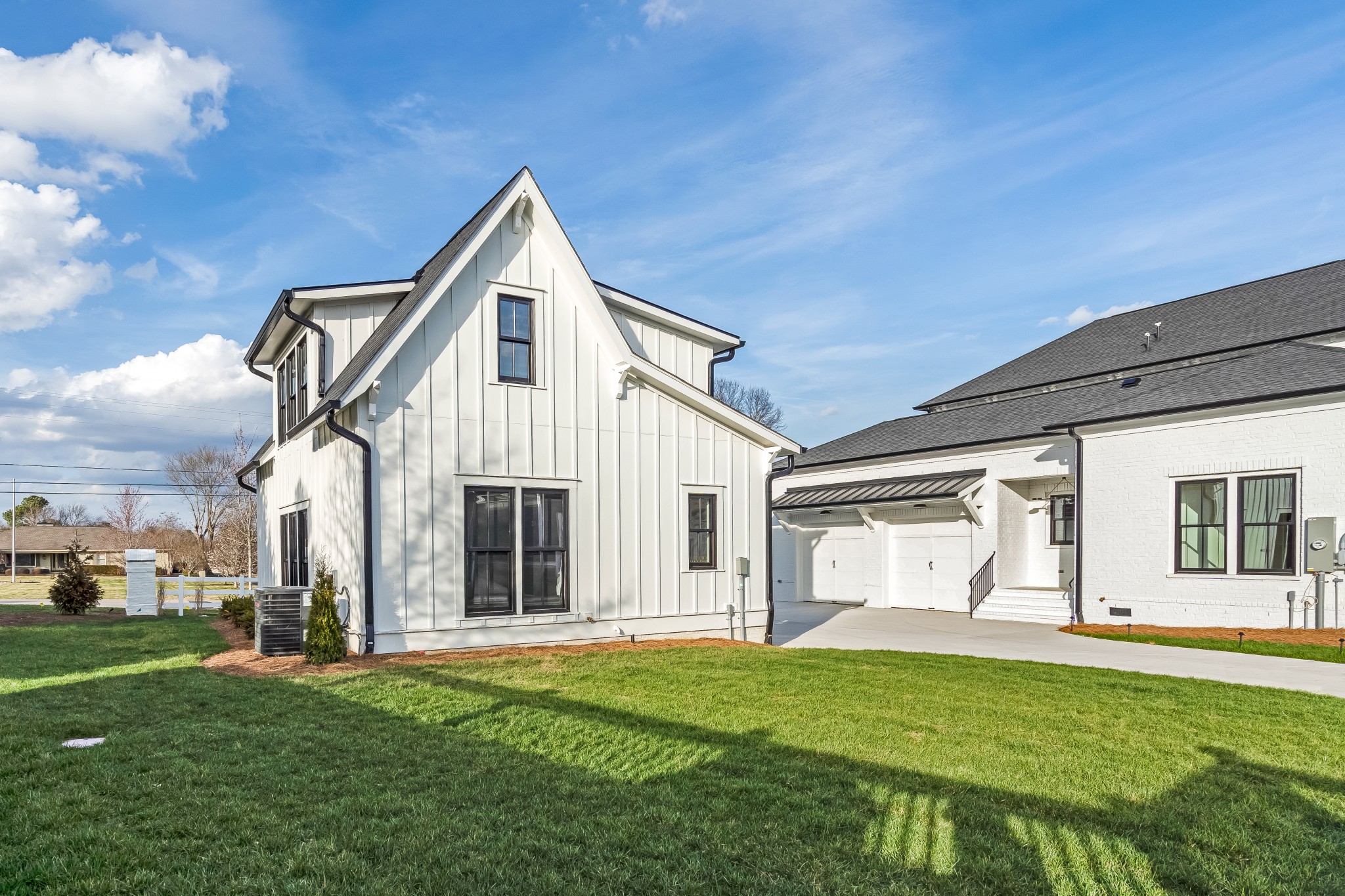 214 Old Peytonsville Road Franklin, TN 37064 - Photo 4 of 42 a front view of a house with a yard