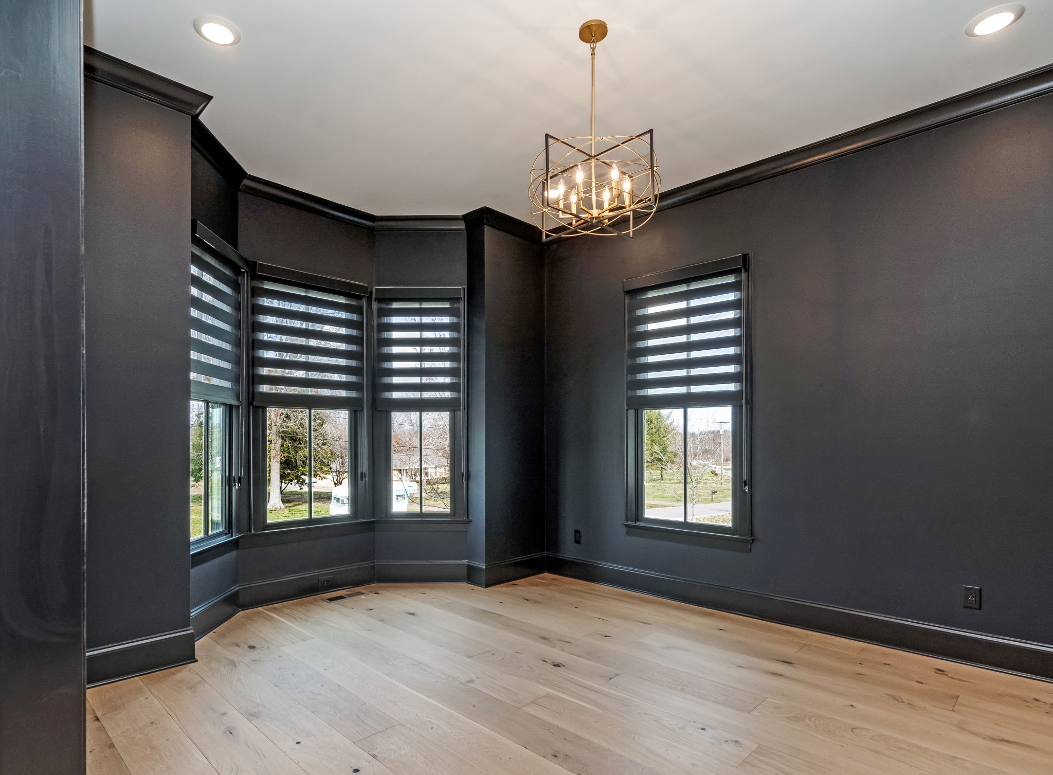 214 Old Peytonsville Road Franklin, TN 37064 - Photo 6 of 42 a view of a livingroom with a chandelier wooden floor and windows