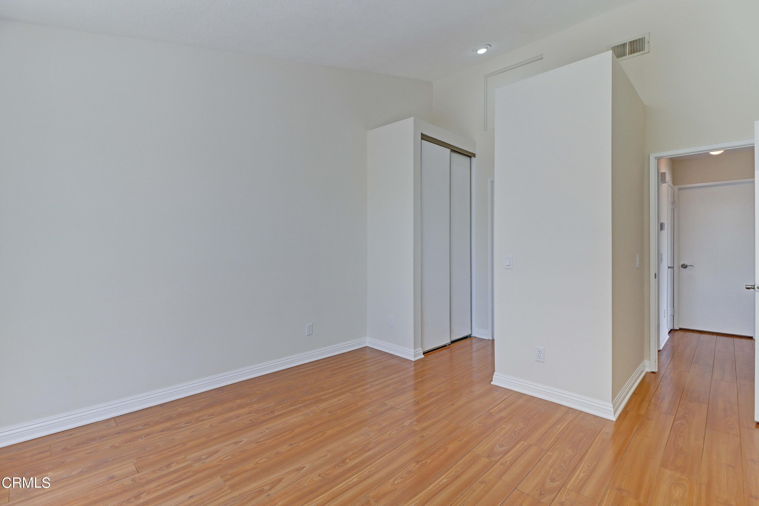 12399 Blazing Star Court Rancho Cucamonga, CA 91739 - Photo 14 of 24 a view of a room with wooden floor