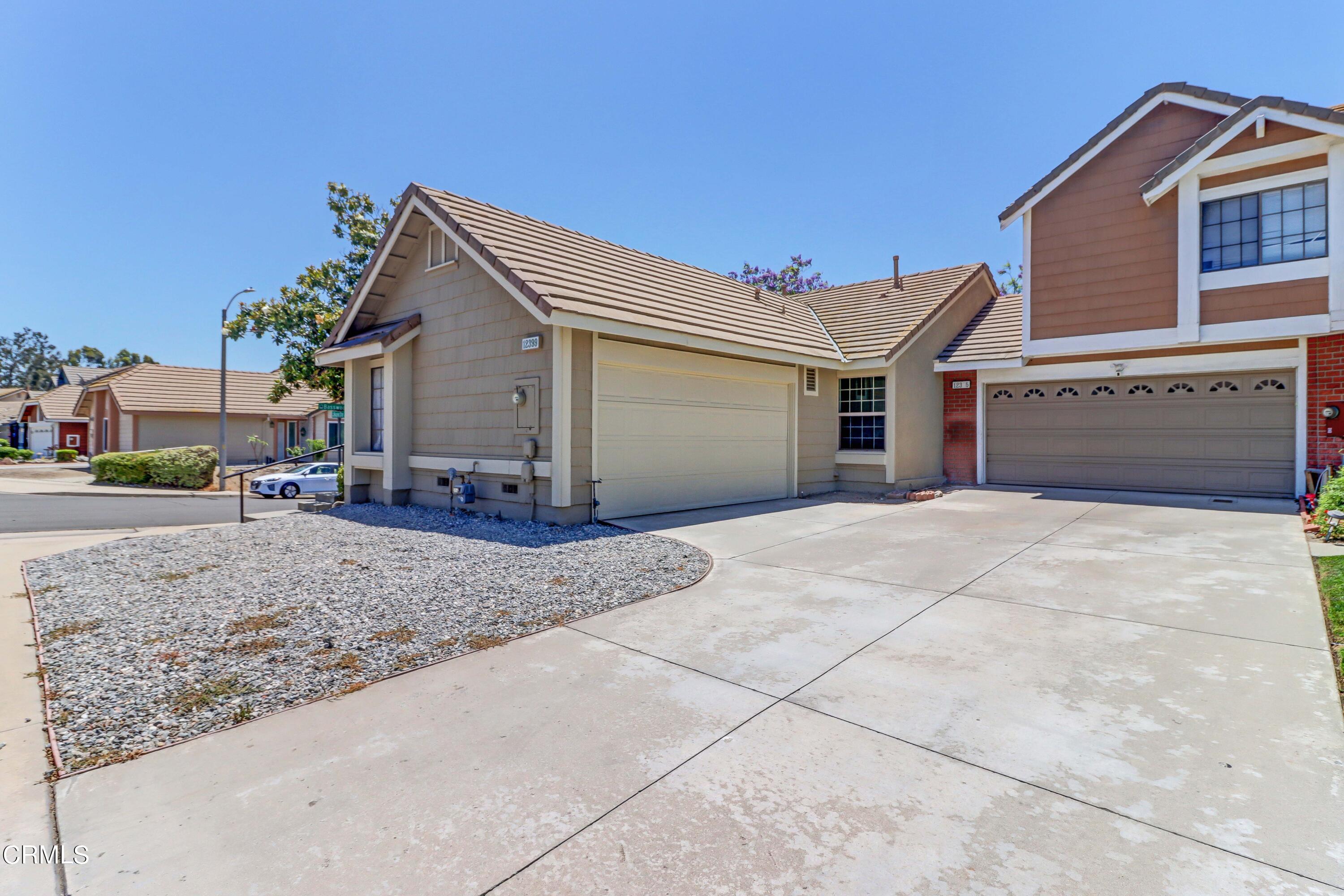 12399 Blazing Star Court Rancho Cucamonga, CA 91739 - Photo 2 of 24 a view of a house with a backyard