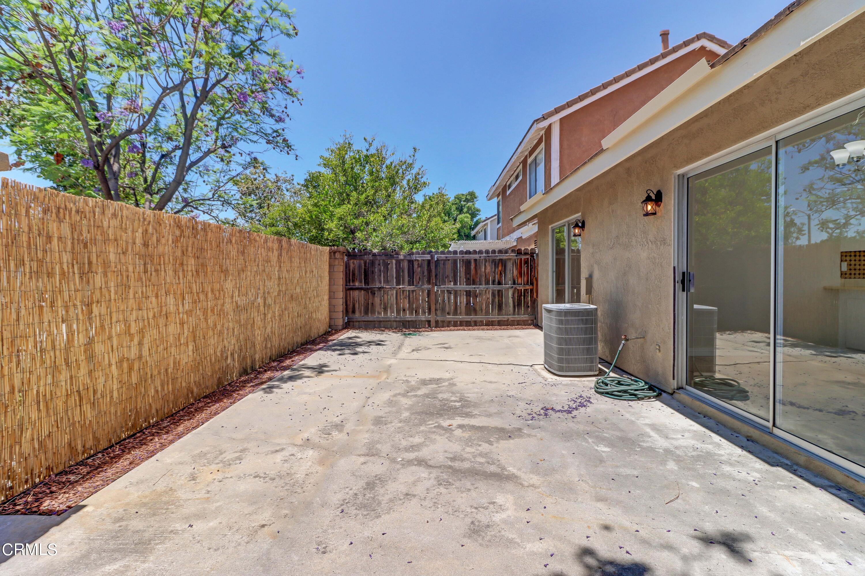 12399 Blazing Star Court Rancho Cucamonga, CA 91739 - Photo 21 of 24 a view of a house with a backyard