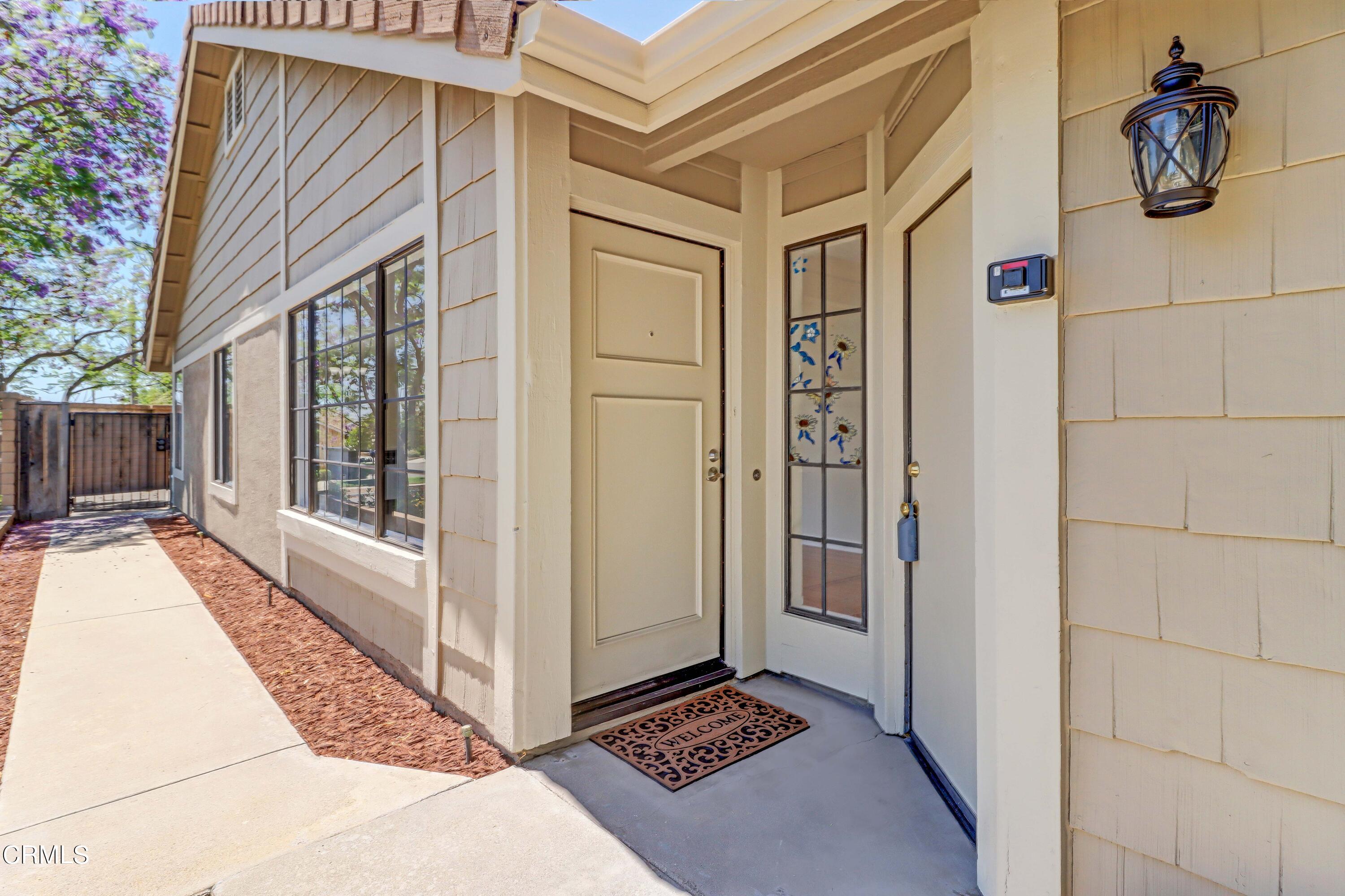 12399 Blazing Star Court Rancho Cucamonga, CA 91739 - Photo 4 of 24 a view of a balcony a door and wooden floor