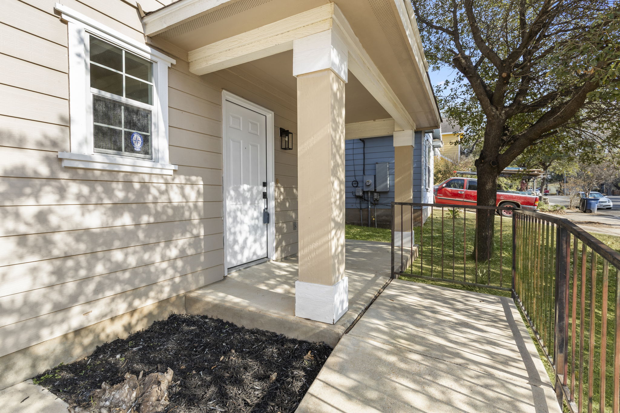 2110 Nogales Trail Austin, TX 78744 - Photo 4 of 37 a view of a pathway of a house with a backyard