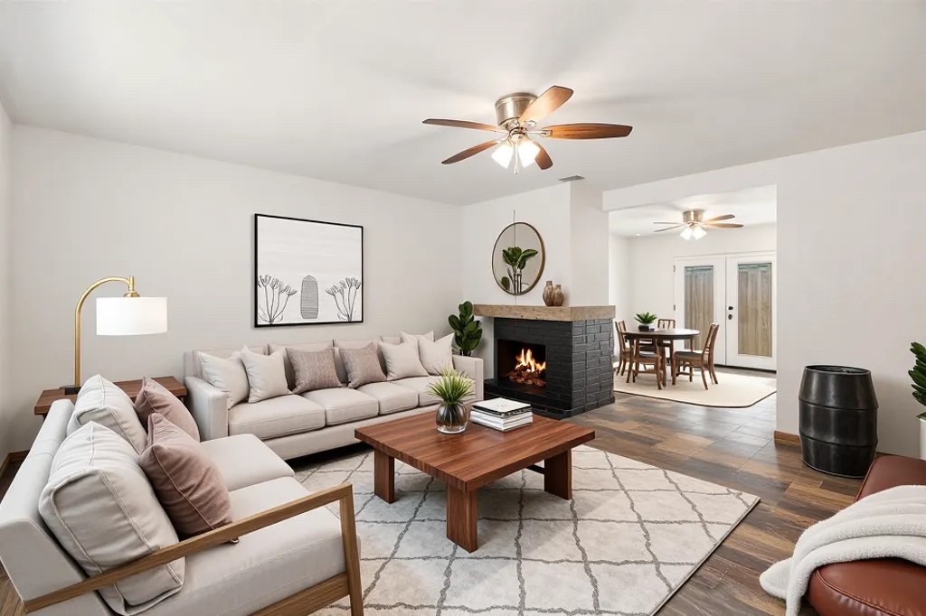 2406 Berkeley Avenue, Unit B Austin, TX 78745 - Photo 2 of 24 a living room with furniture a fireplace and a window