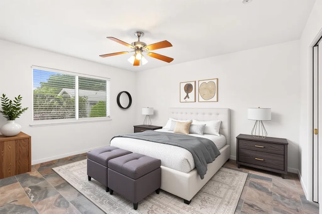 2406 Berkeley Avenue, Unit B Austin, TX 78745 - Photo 22 of 24 a bedroom with a bed couches and a potted plant