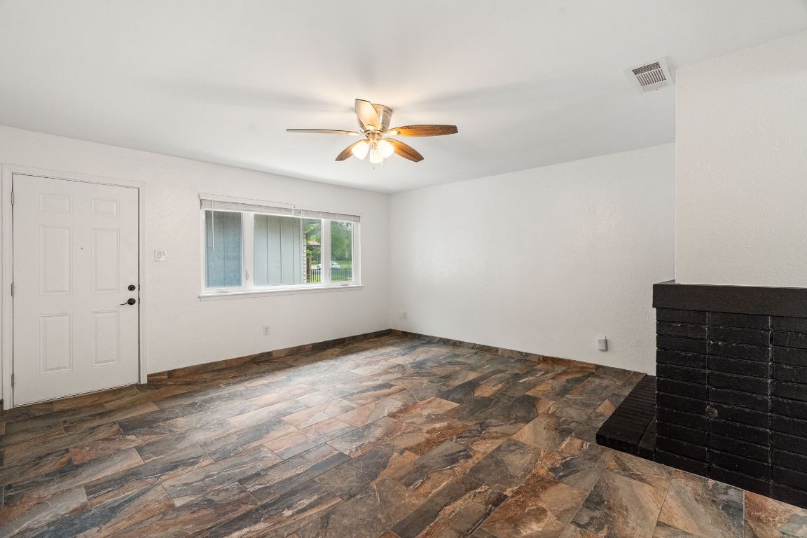 2406 Berkeley Avenue, Unit B Austin, TX 78745 - Photo 9 of 24 a view of an empty room with a window