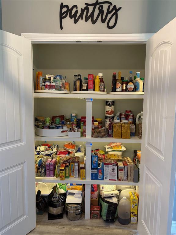 424 Meadow Green Drive Davenport, FL 33837 - Photo 15 of 47 a view of storage and utility room