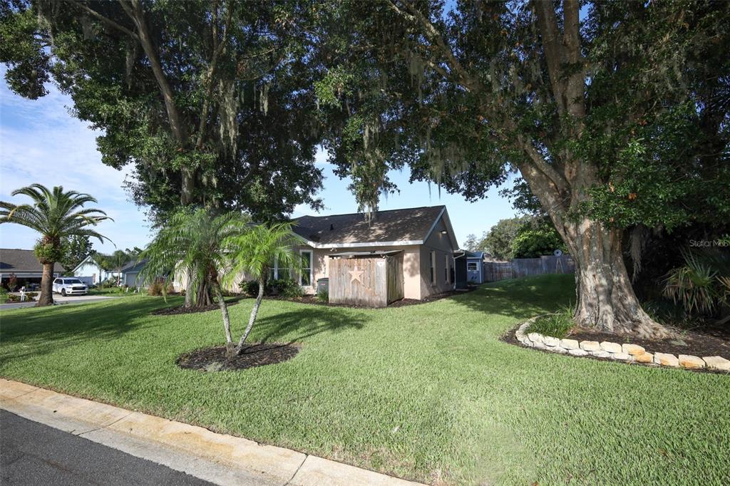 424 Meadow Green Drive Davenport, FL 33837 - Photo 44 of 47 a view of a house with a yard