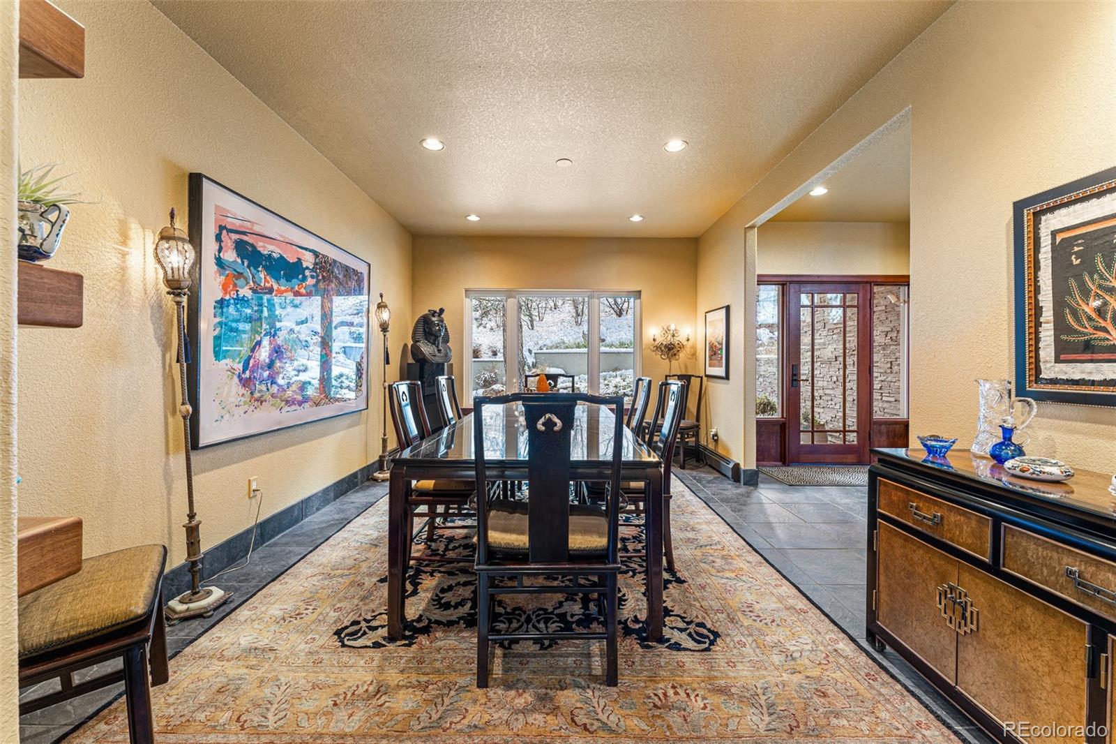 395 Timber Lane Boulder, CO 80304 - Photo 14 of 37 a view of a dining room with furniture window and wooden floor