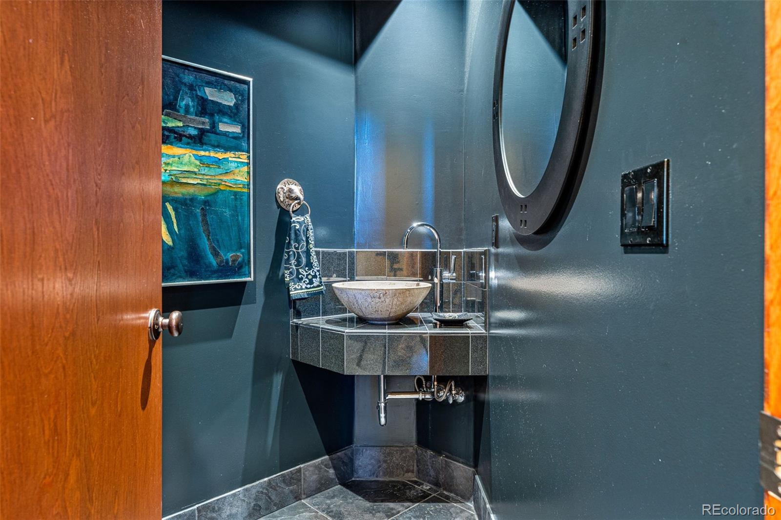 395 Timber Lane Boulder, CO 80304 - Photo 15 of 37 a bathroom with a sink and a mirror