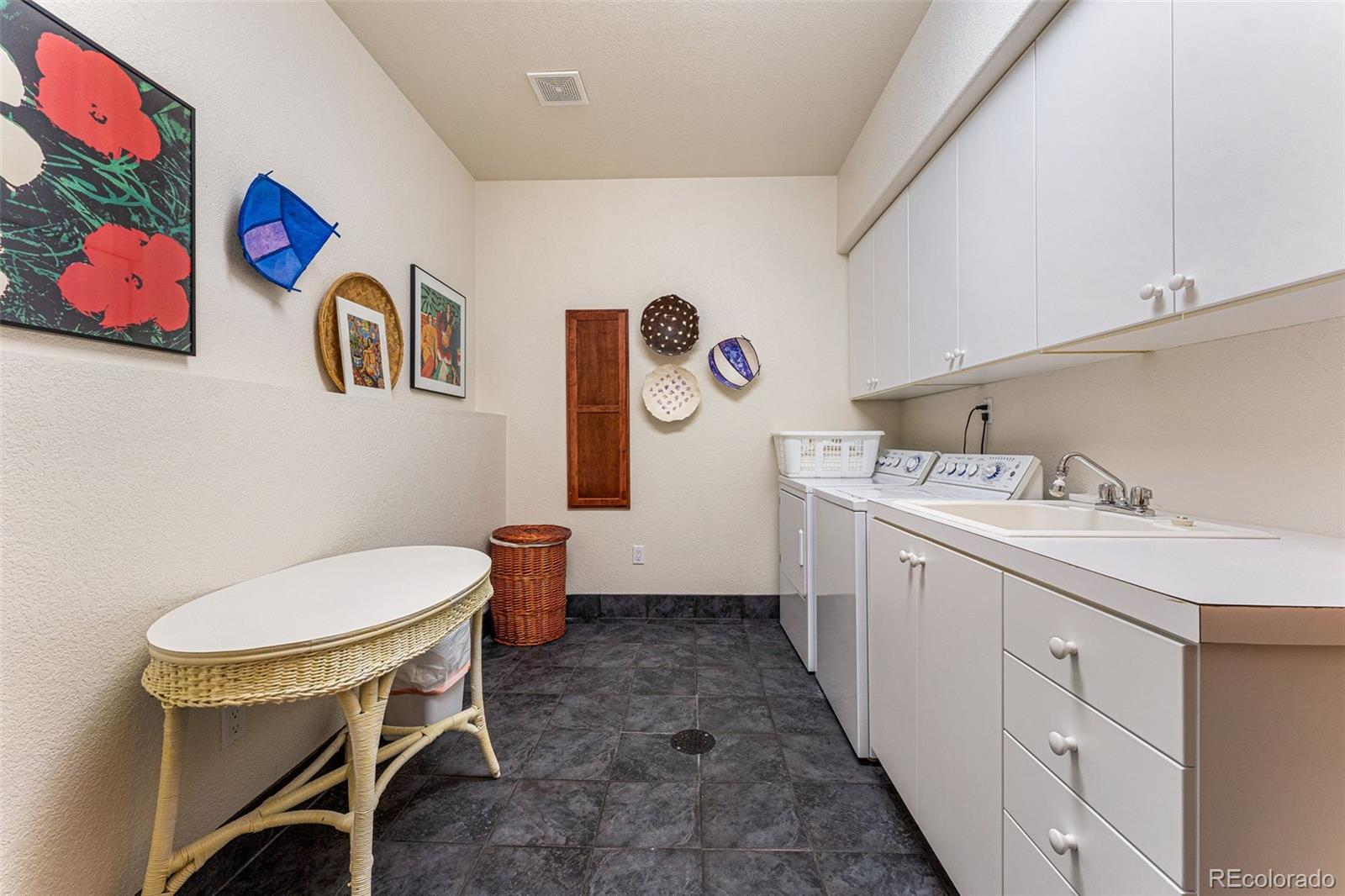 395 Timber Lane Boulder, CO 80304 - Photo 30 of 37 a bathroom with a sink a toilet and a window