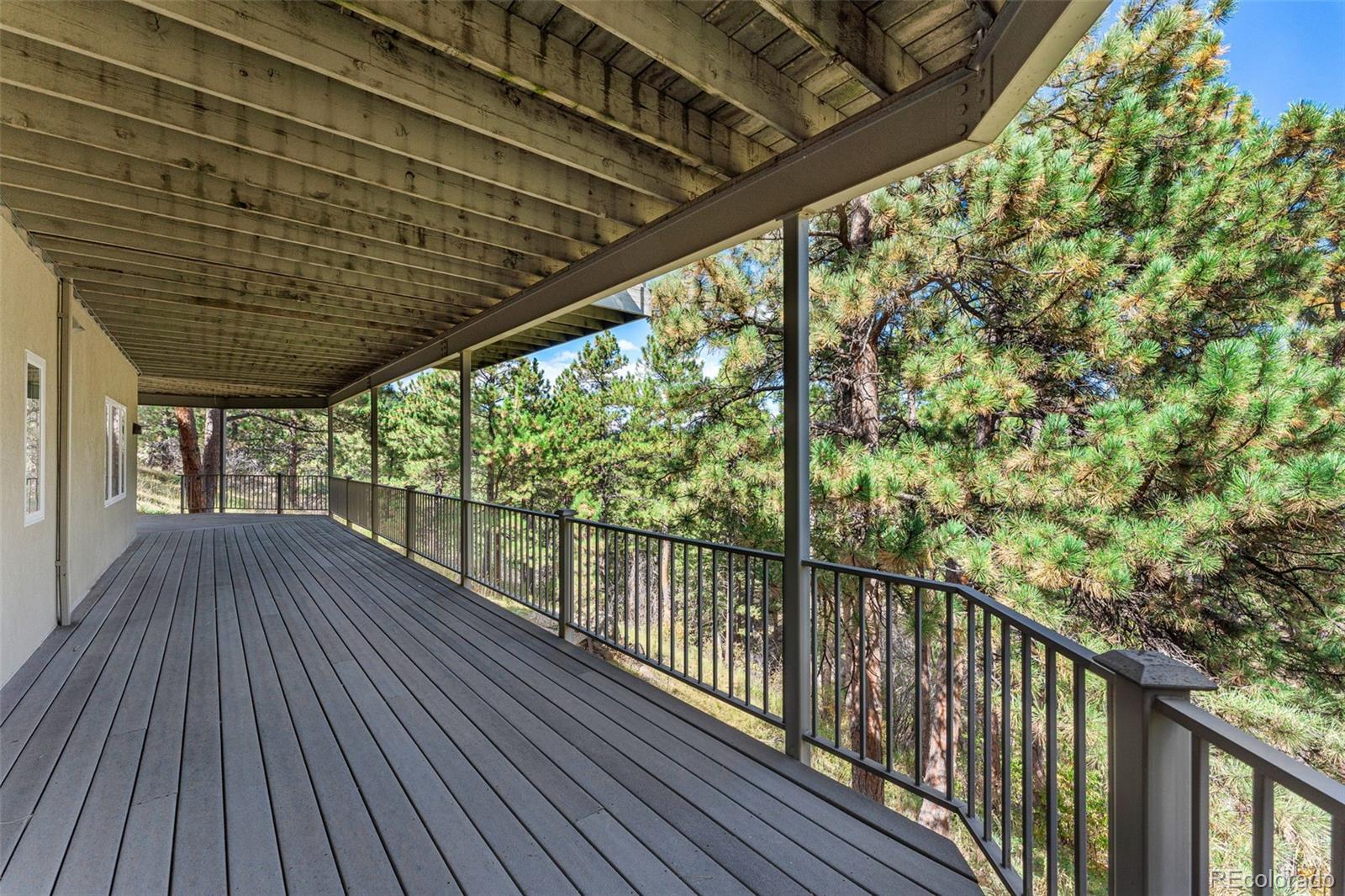 395 Timber Lane Boulder, CO 80304 - Photo 34 of 37 a view of balcony with wooden floor