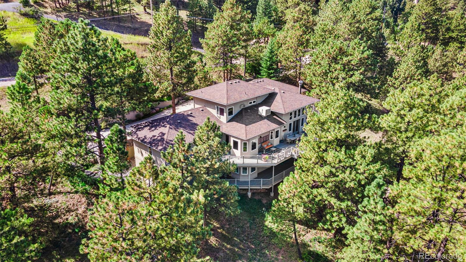 395 Timber Lane Boulder, CO 80304 - Photo 4 of 37 an aerial view of a house with yard swimming pool and outdoor seating