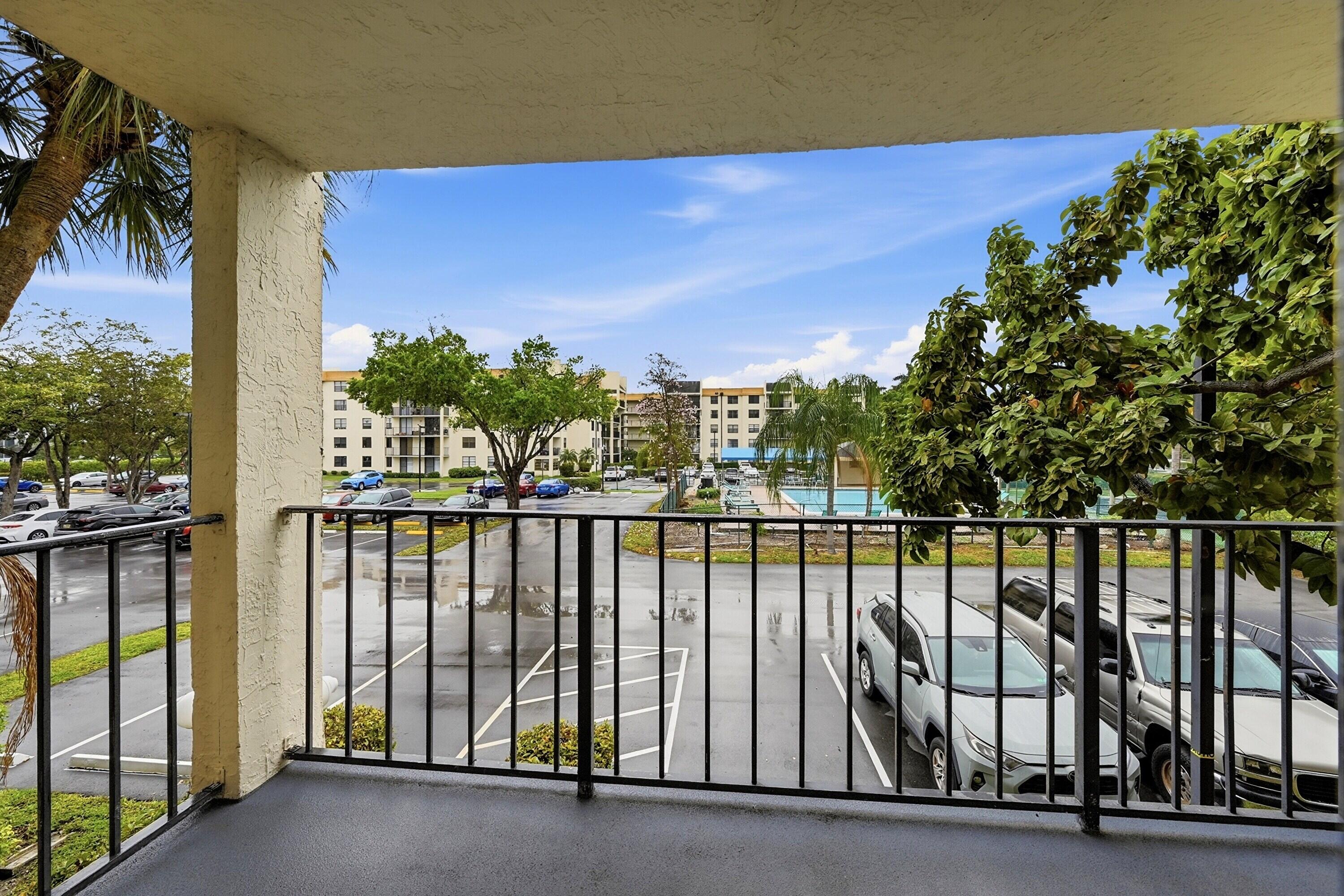 6195 Rock Island Road, Unit 210 Tamarac, FL 33319 - Photo 20 of 26 a view of balcony with outdoor space
