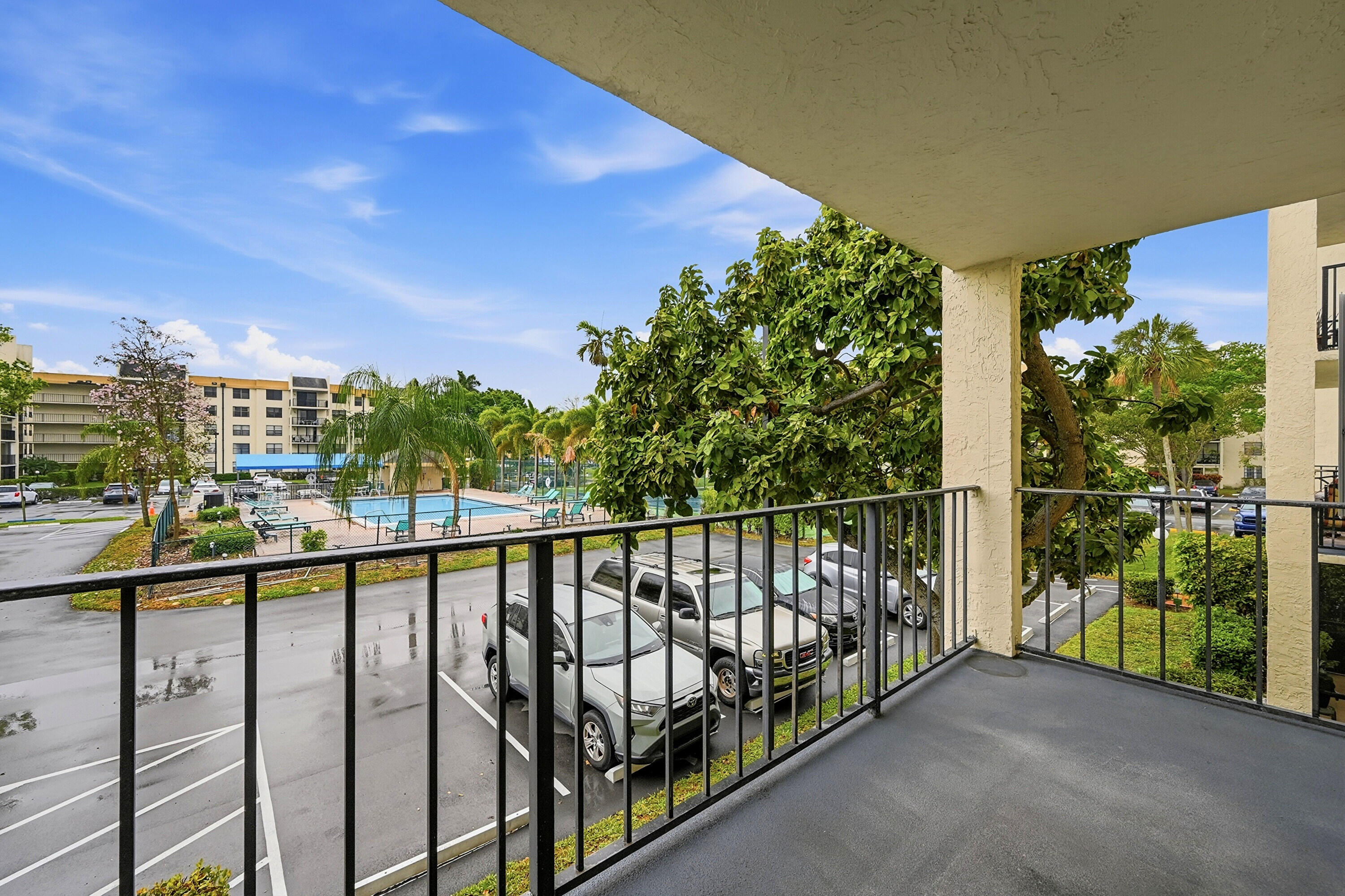 6195 Rock Island Road, Unit 210 Tamarac, FL 33319 - Photo 21 of 26 a view of a balcony