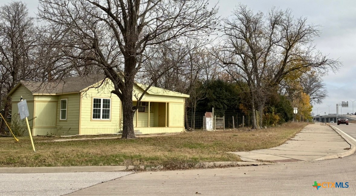 813 South 53rd Street Temple, TX 76504 - Photo 1 of 12 a front view of a house with a yard