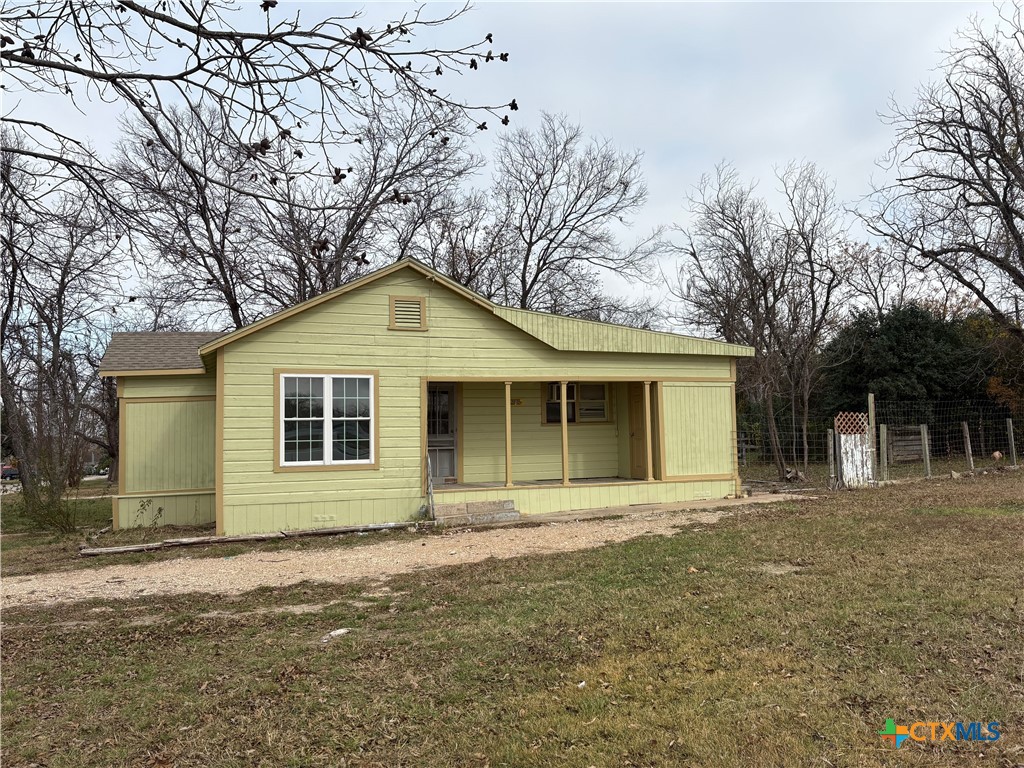 813 South 53rd Street Temple, TX 76504 - Photo 2 of 12 a front view of a house with a garden