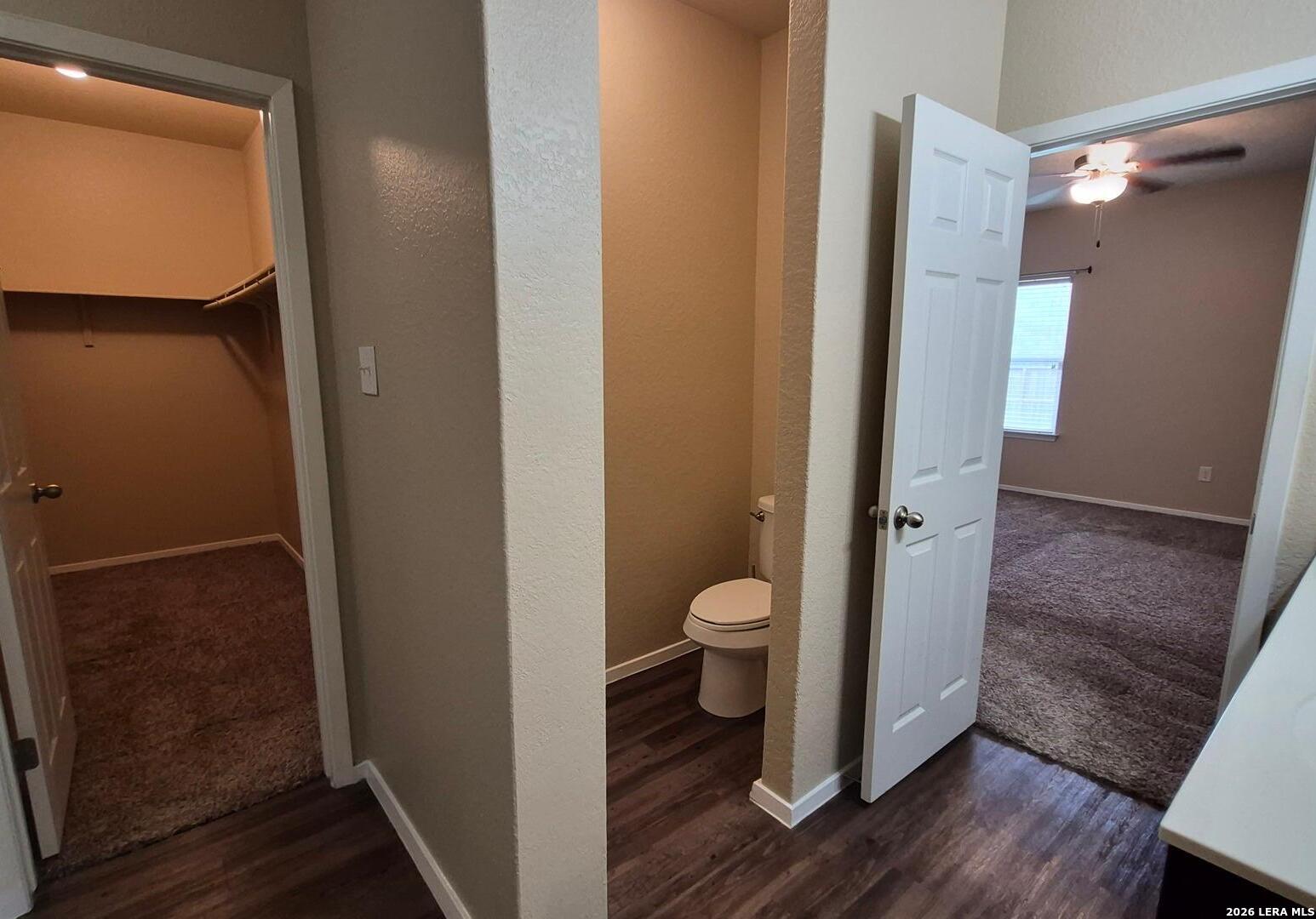 7102 Zuma Beach Converse, TX 78109 - Photo 24 of 31 a bathroom with a toilet and a mirror