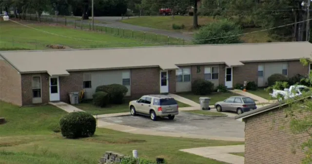 a car parked in front of the house