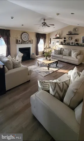 a bathroom with a sink mirror vanity and toilet