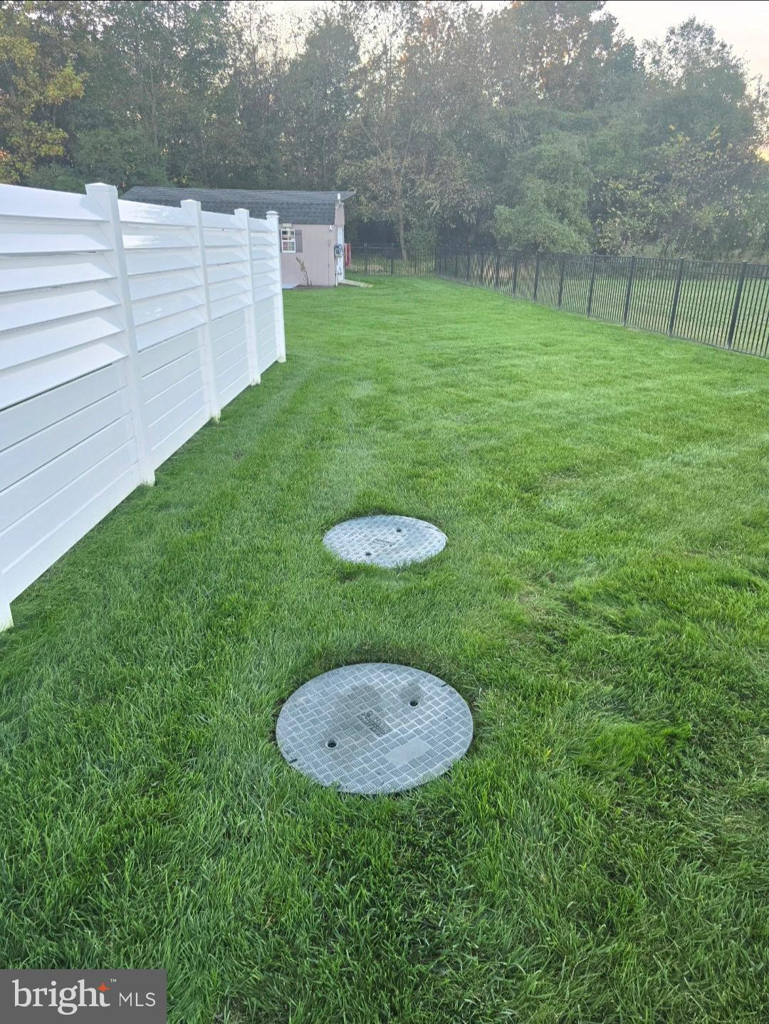 247 Cider Run Magnolia, DE 19962 - Photo 15 of 15 a view of a backyard with a trampoline
