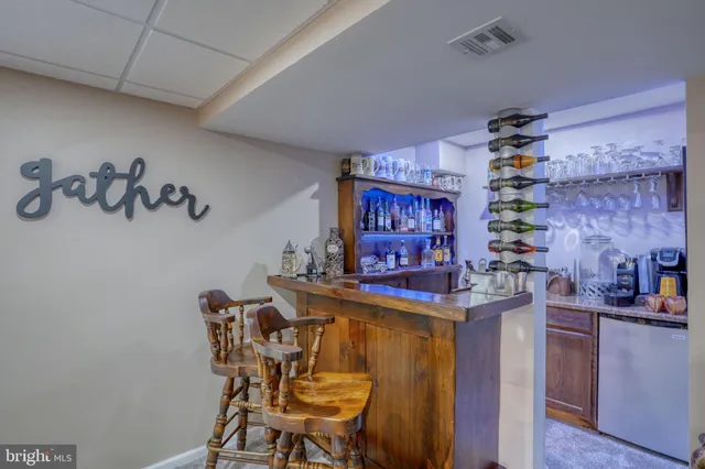 a dining room with a table and chairs