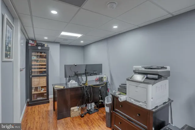 a view of a workspace with furniture