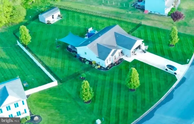 a house view with a garden space